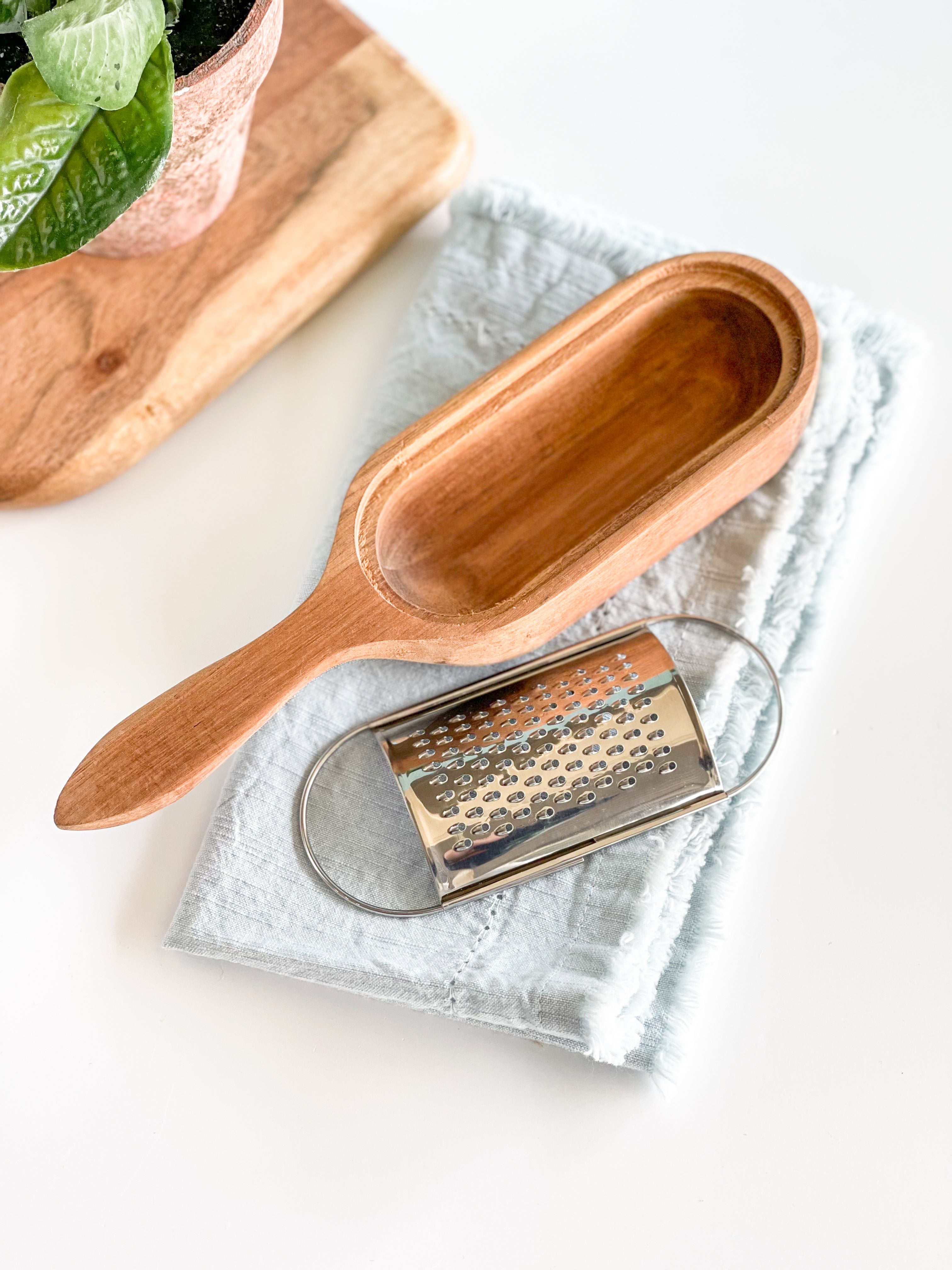 http://southernlyplace.com/cdn/shop/products/wood-handheld-cheese-grater.jpg?v=1654892309