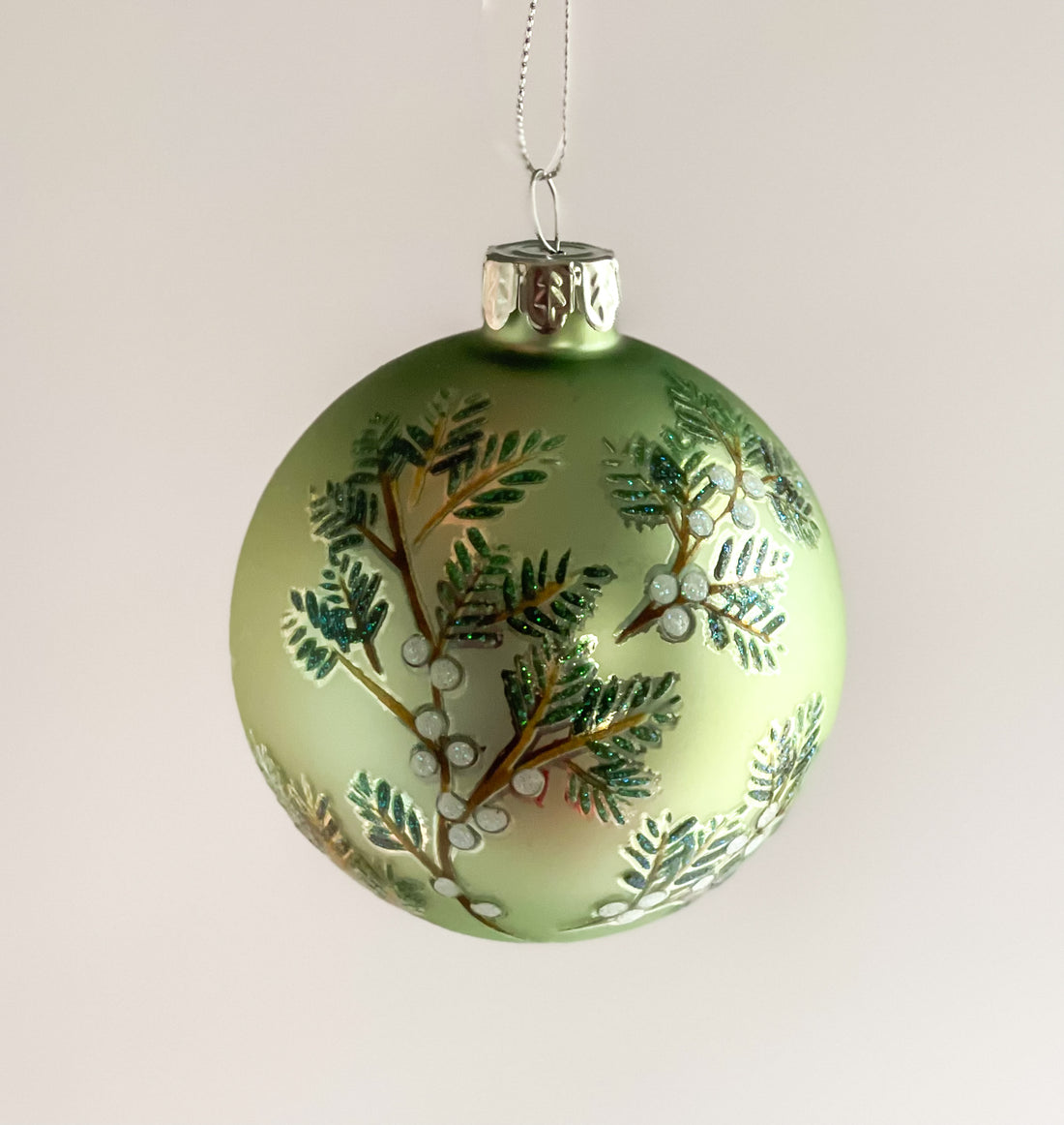 Pine Boughs With White Berries Round Glass Ornament