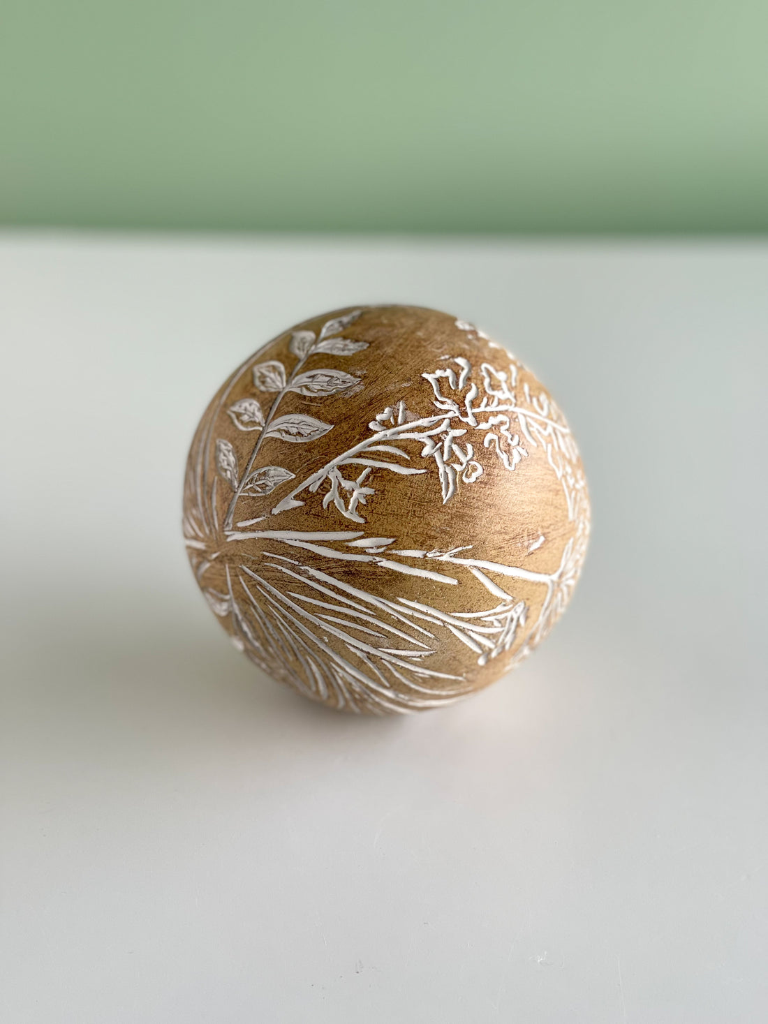 Wooden Orb With Floral Accents